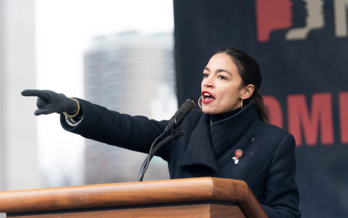 AOC Whines While Drinking in Comfort